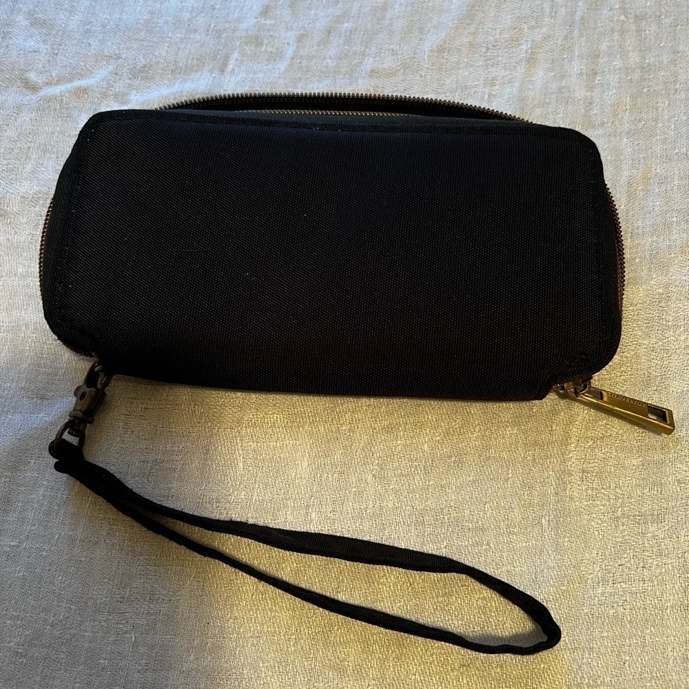 Travelon wallet in black. Zipper close. Wristlet strap. Great for travel. - Picture 2 of 6